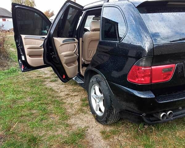 Черный БМВ Х5, объемом двигателя 3 л и пробегом 462 тыс. км за 12900 $, фото 14 на Automoto.ua