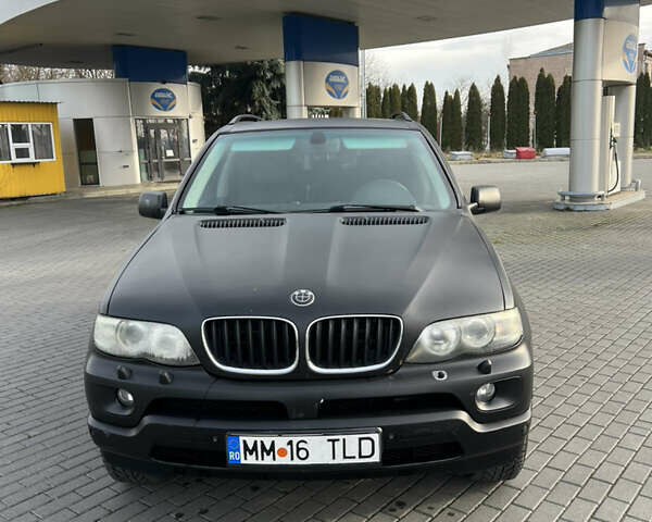 Чорний БМВ Х5, об'ємом двигуна 3 л та пробігом 300 тис. км за 4999 $, фото 5 на Automoto.ua