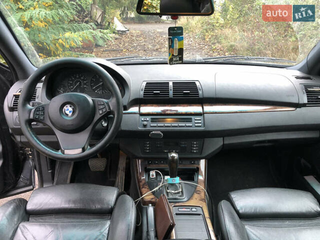Черный БМВ Х5, объемом двигателя 4.4 л и пробегом 265 тыс. км за 9100 $, фото 10 на Automoto.ua