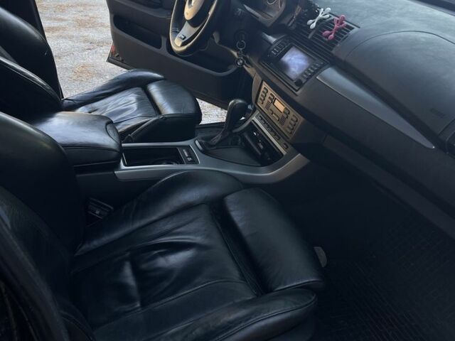 Черный БМВ Х5, объемом двигателя 3 л и пробегом 380 тыс. км за 11200 $, фото 9 на Automoto.ua