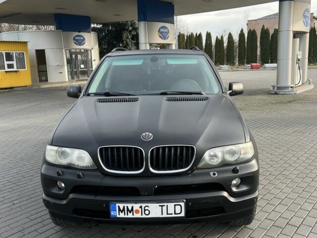 Черный БМВ Х5, объемом двигателя 3 л и пробегом 300 тыс. км за 4750 $, фото 4 на Automoto.ua