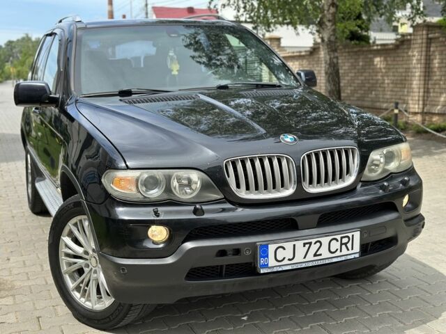Черный БМВ Х5, объемом двигателя 3 л и пробегом 300 тыс. км за 6100 $, фото 2 на Automoto.ua