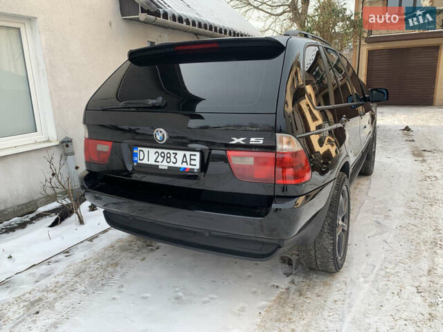 Черный БМВ Х5, объемом двигателя 3 л и пробегом 440 тыс. км за 11800 $, фото 1 на Automoto.ua