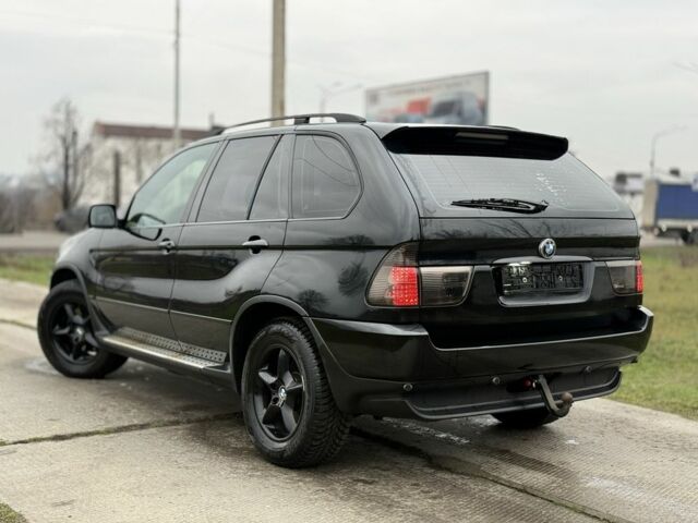 Чорний БМВ Х5, об'ємом двигуна 3 л та пробігом 310 тис. км за 6850 $, фото 4 на Automoto.ua