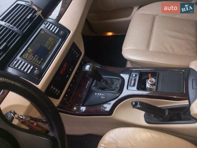 Черный БМВ Х5, объемом двигателя 3 л и пробегом 331 тыс. км за 12500 $, фото 16 на Automoto.ua