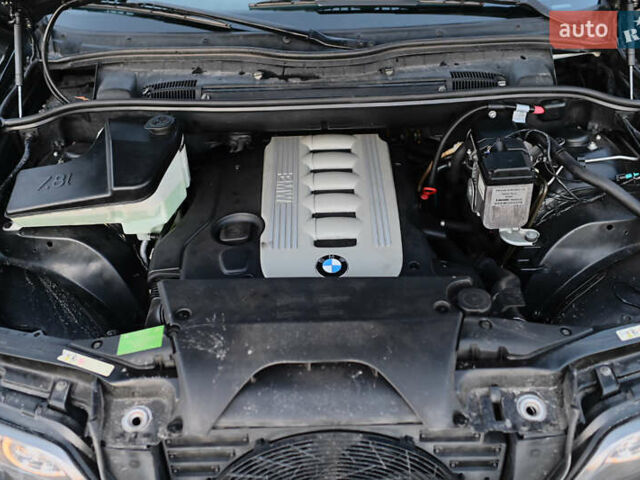 Чорний БМВ Х5, об'ємом двигуна 3 л та пробігом 174 тис. км за 18350 $, фото 68 на Automoto.ua