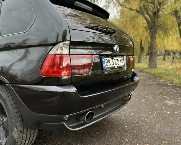 Черный БМВ Х5, объемом двигателя 3 л и пробегом 342 тыс. км за 11800 $, фото 6 на Automoto.ua
