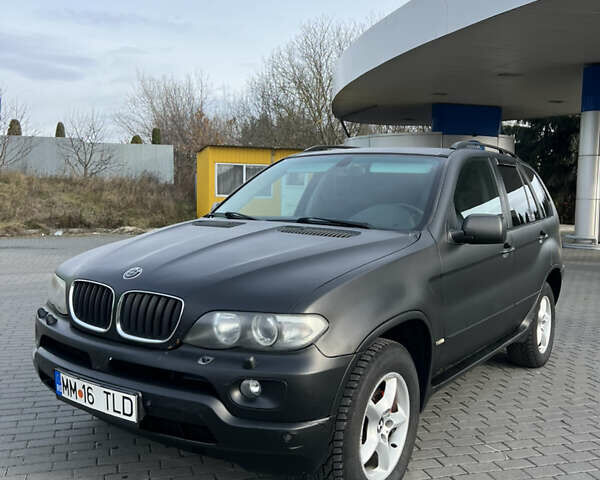 Чорний БМВ Х5, об'ємом двигуна 3 л та пробігом 300 тис. км за 4999 $, фото 2 на Automoto.ua
