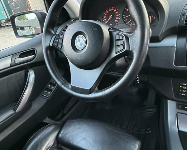 Чорний БМВ Х5, об'ємом двигуна 3 л та пробігом 320 тис. км за 12999 $, фото 20 на Automoto.ua