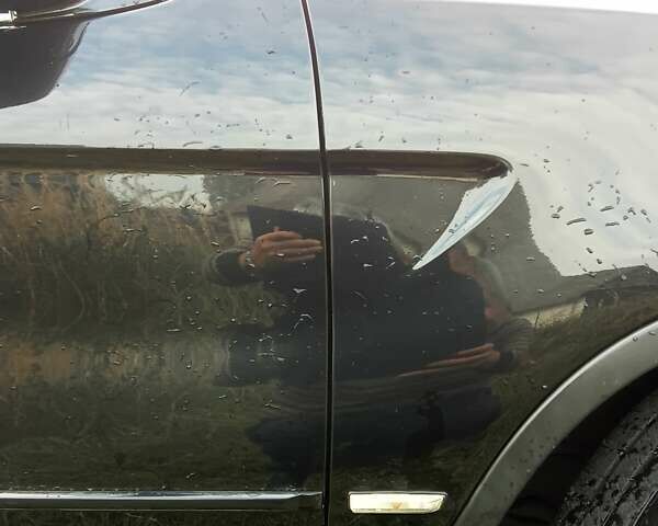 Черный БМВ Х5, объемом двигателя 3 л и пробегом 462 тыс. км за 12900 $, фото 69 на Automoto.ua