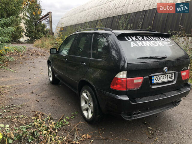 Черный БМВ Х5, объемом двигателя 4.4 л и пробегом 265 тыс. км за 9100 $, фото 6 на Automoto.ua