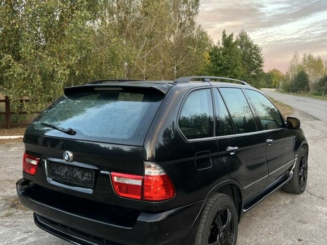 Чорний БМВ Х5, об'ємом двигуна 3 л та пробігом 400 тис. км за 6000 $, фото 6 на Automoto.ua