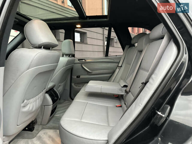 Чорний БМВ Х5, об'ємом двигуна 3 л та пробігом 304 тис. км за 10350 $, фото 80 на Automoto.ua