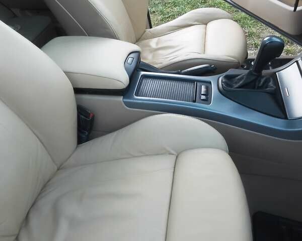 Черный БМВ Х5, объемом двигателя 3 л и пробегом 462 тыс. км за 12900 $, фото 49 на Automoto.ua