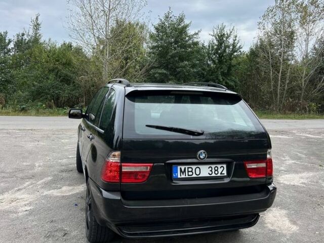 Чорний БМВ Х5, об'ємом двигуна 3 л та пробігом 400 тис. км за 5600 $, фото 2 на Automoto.ua