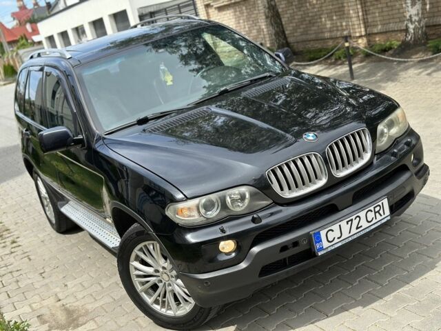 Черный БМВ Х5, объемом двигателя 3 л и пробегом 300 тыс. км за 6100 $, фото 1 на Automoto.ua