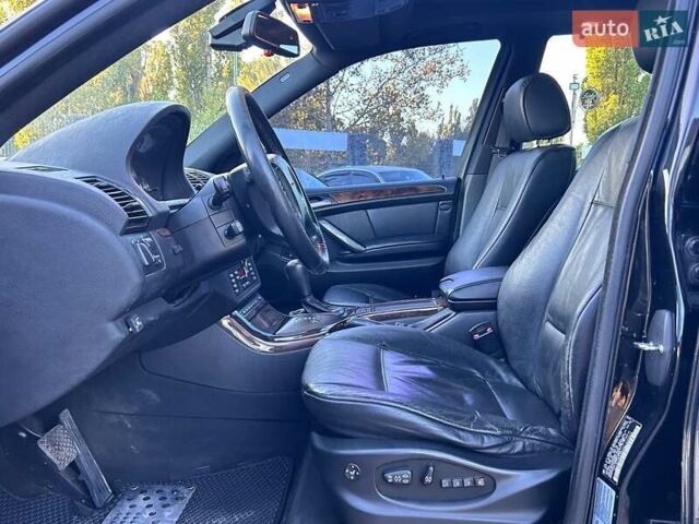 Черный БМВ Х5, объемом двигателя 4.4 л и пробегом 311 тыс. км за 9500 $, фото 12 на Automoto.ua
