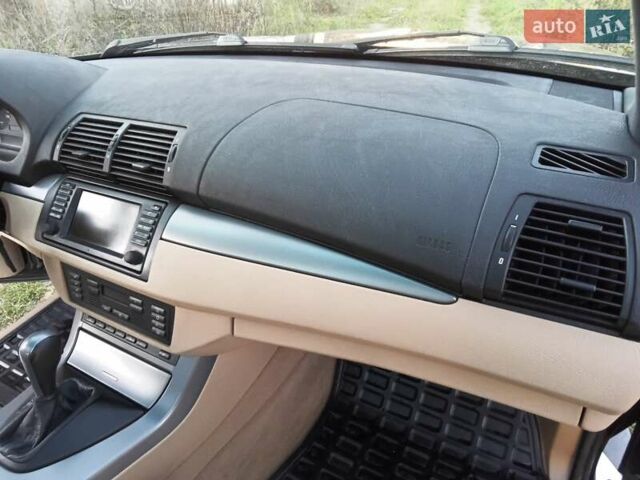 Черный БМВ Х5, объемом двигателя 3 л и пробегом 462 тыс. км за 12900 $, фото 81 на Automoto.ua