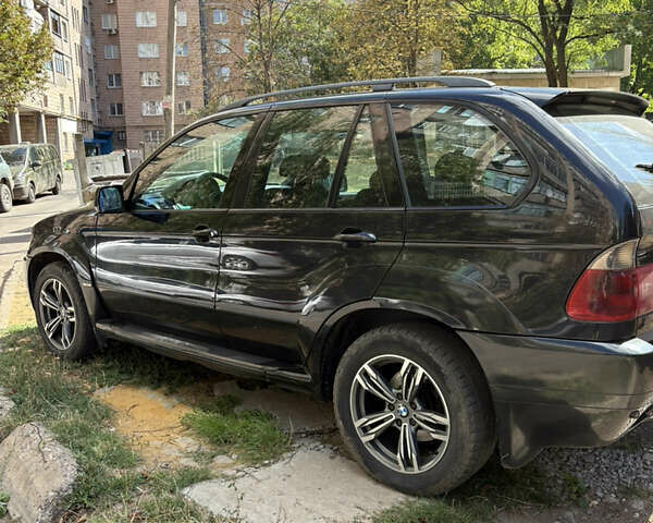 Черный БМВ Х5, объемом двигателя 3 л и пробегом 325 тыс. км за 6500 $, фото 5 на Automoto.ua