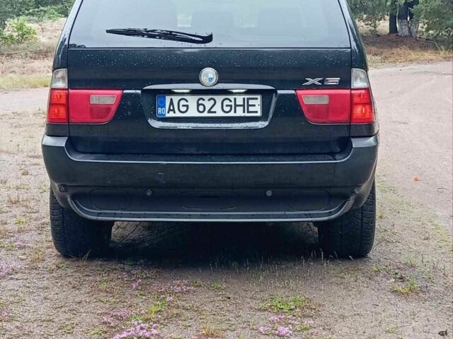 Чорний БМВ Х5, об'ємом двигуна 3 л та пробігом 400 тис. км за 5999 $, фото 8 на Automoto.ua