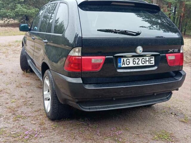 Чорний БМВ Х5, об'ємом двигуна 3 л та пробігом 400 тис. км за 5999 $, фото 9 на Automoto.ua