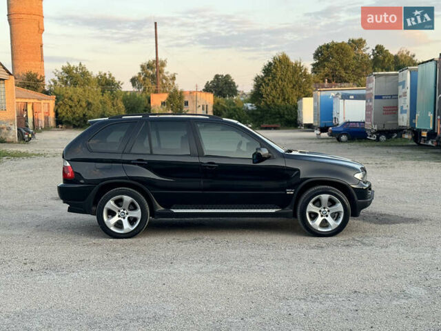 Чорний БМВ Х5, об'ємом двигуна 3 л та пробігом 320 тис. км за 12999 $, фото 1 на Automoto.ua