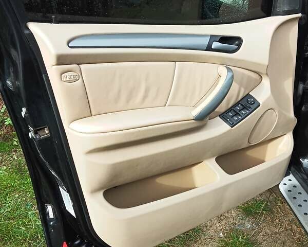 Черный БМВ Х5, объемом двигателя 3 л и пробегом 462 тыс. км за 12900 $, фото 136 на Automoto.ua