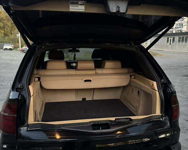 Черный БМВ Х5, объемом двигателя 3 л и пробегом 307 тыс. км за 11000 $, фото 10 на Automoto.ua