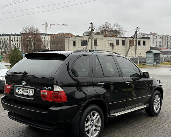 Черный БМВ Х5, объемом двигателя 3 л и пробегом 370 тыс. км за 10900 $, фото 10 на Automoto.ua