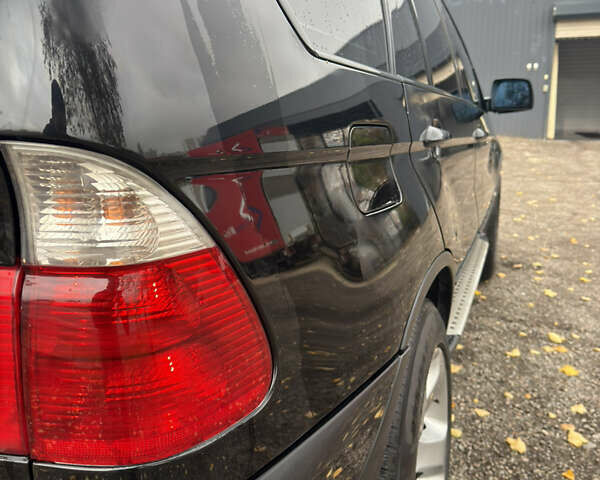 Черный БМВ Х5, объемом двигателя 3 л и пробегом 373 тыс. км за 9500 $, фото 16 на Automoto.ua