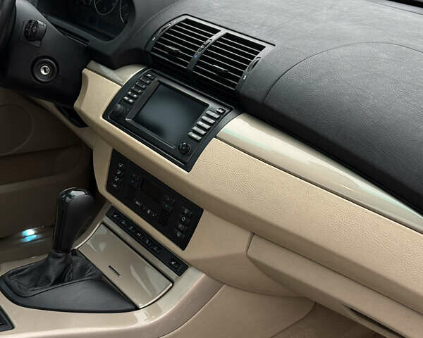 Черный БМВ Х5, объемом двигателя 3 л и пробегом 370 тыс. км за 10900 $, фото 52 на Automoto.ua