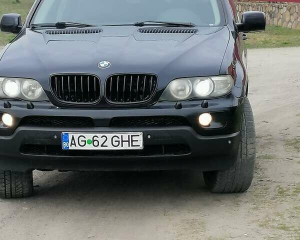 Черный БМВ Х5, объемом двигателя 3 л и пробегом 450 тыс. км за 6199 $, фото 1 на Automoto.ua