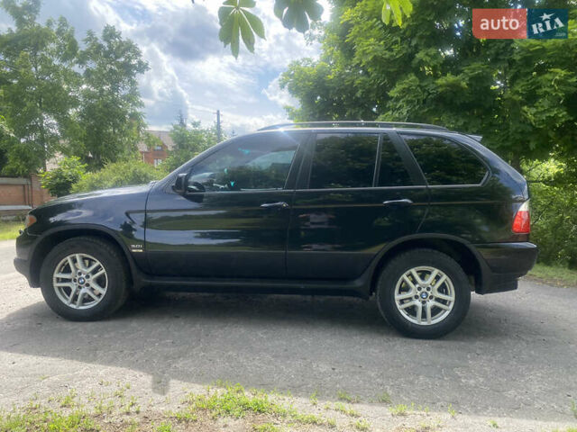 Черный БМВ Х5, объемом двигателя 3 л и пробегом 318 тыс. км за 11900 $, фото 4 на Automoto.ua