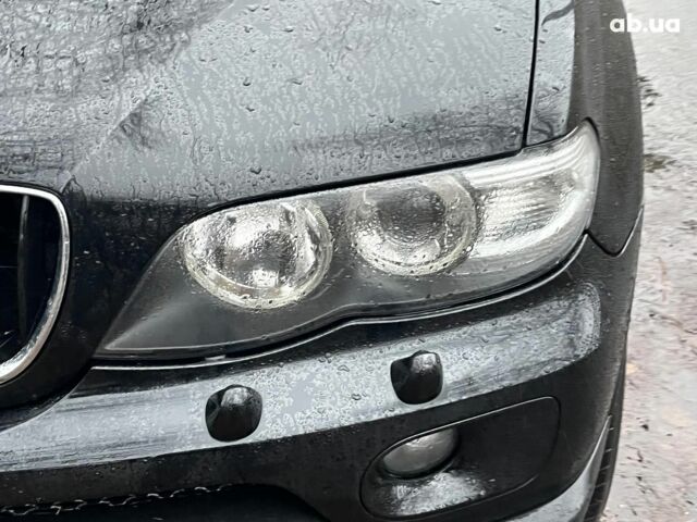 Черный БМВ Х5, объемом двигателя 3 л и пробегом 419 тыс. км за 12790 $, фото 4 на Automoto.ua