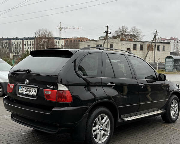 Черный БМВ Х5, объемом двигателя 3 л и пробегом 370 тыс. км за 10900 $, фото 9 на Automoto.ua