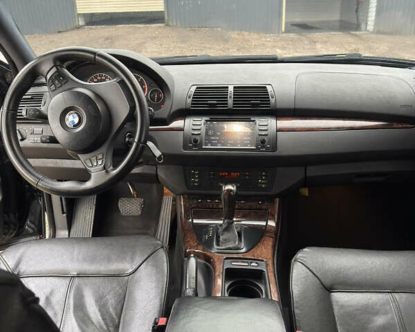Черный БМВ Х5, объемом двигателя 3 л и пробегом 373 тыс. км за 9500 $, фото 6 на Automoto.ua