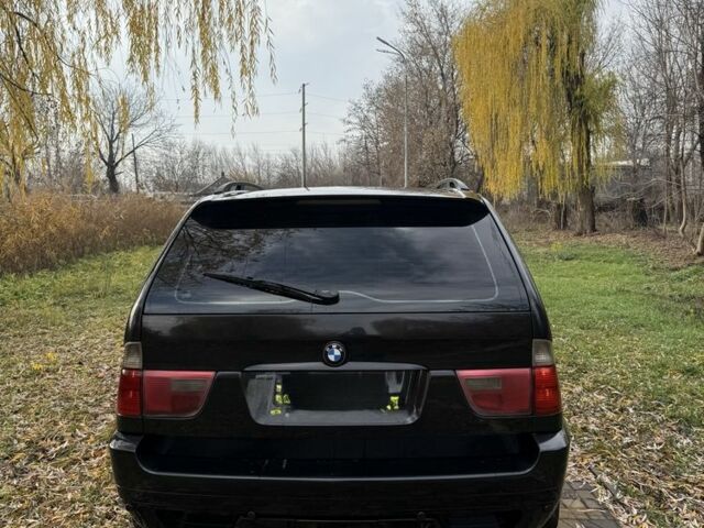 Черный БМВ Х5, объемом двигателя 3 л и пробегом 324 тыс. км за 6300 $, фото 4 на Automoto.ua