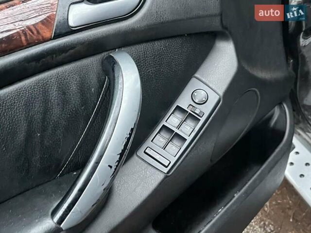 Черный БМВ Х5, объемом двигателя 3 л и пробегом 419 тыс. км за 12790 $, фото 21 на Automoto.ua