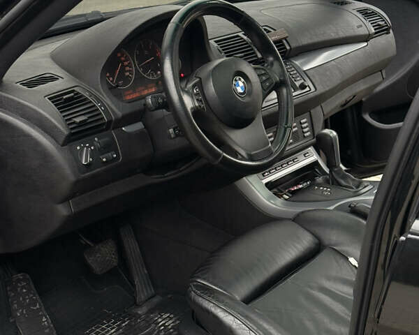 Черный БМВ Х5, объемом двигателя 3 л и пробегом 422 тыс. км за 12500 $, фото 16 на Automoto.ua