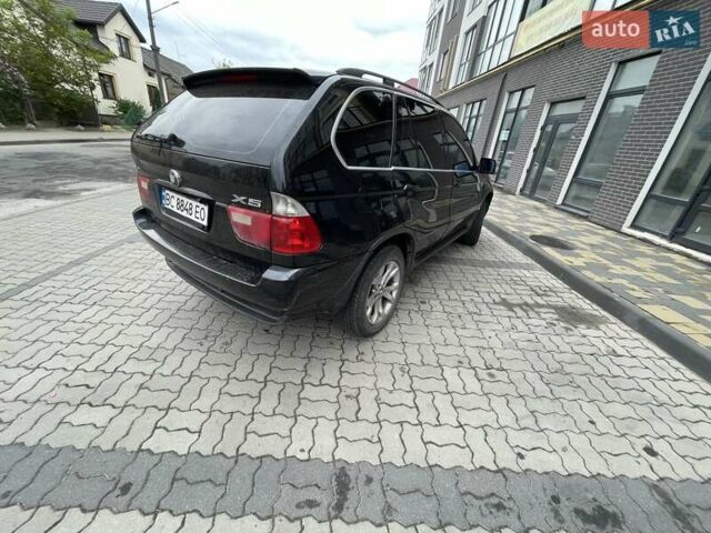 Черный БМВ Х5, объемом двигателя 3 л и пробегом 285 тыс. км за 11990 $, фото 15 на Automoto.ua