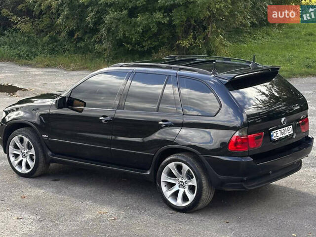 Чорний БМВ Х5, об'ємом двигуна 3 л та пробігом 400 тис. км за 11500 $, фото 4 на Automoto.ua