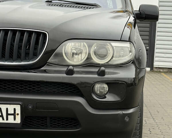 Черный БМВ Х5, объемом двигателя 3 л и пробегом 370 тыс. км за 10900 $, фото 18 на Automoto.ua