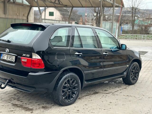 Чорний БМВ Х5, об'ємом двигуна 3 л та пробігом 264 тис. км за 5000 $, фото 4 на Automoto.ua