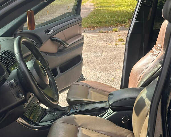 Чорний БМВ Х5, об'ємом двигуна 3 л та пробігом 400 тис. км за 11500 $, фото 12 на Automoto.ua