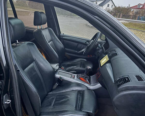 Черный БМВ Х5, объемом двигателя 2.99 л и пробегом 334 тыс. км за 11200 $, фото 48 на Automoto.ua