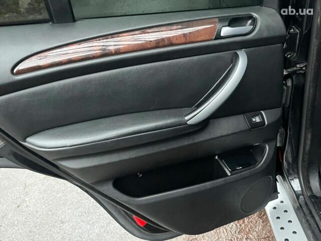 Черный БМВ Х5, объемом двигателя 3 л и пробегом 419 тыс. км за 12790 $, фото 30 на Automoto.ua