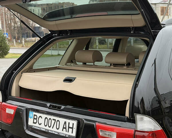 Черный БМВ Х5, объемом двигателя 3 л и пробегом 370 тыс. км за 10900 $, фото 54 на Automoto.ua