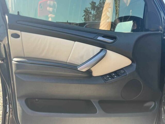 Чорний БМВ Х5, об'ємом двигуна 4.8 л та пробігом 280 тис. км за 13300 $, фото 7 на Automoto.ua