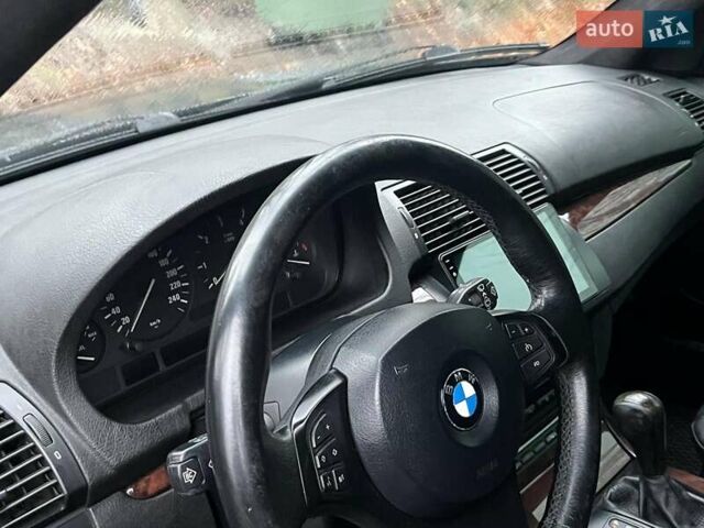 Черный БМВ Х5, объемом двигателя 3 л и пробегом 419 тыс. км за 12790 $, фото 25 на Automoto.ua