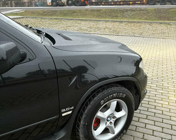 Черный БМВ Х5, объемом двигателя 2.99 л и пробегом 334 тыс. км за 11200 $, фото 27 на Automoto.ua